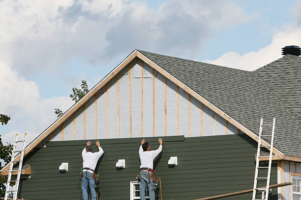 Professional Siding technician working in Phoenix, NY